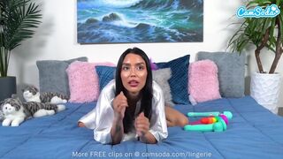 Cute brown-haired teenage girl filling her pussy with more toys