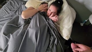 She's pissing on two little black-haired girls in bed and they're kissing in their wet pants